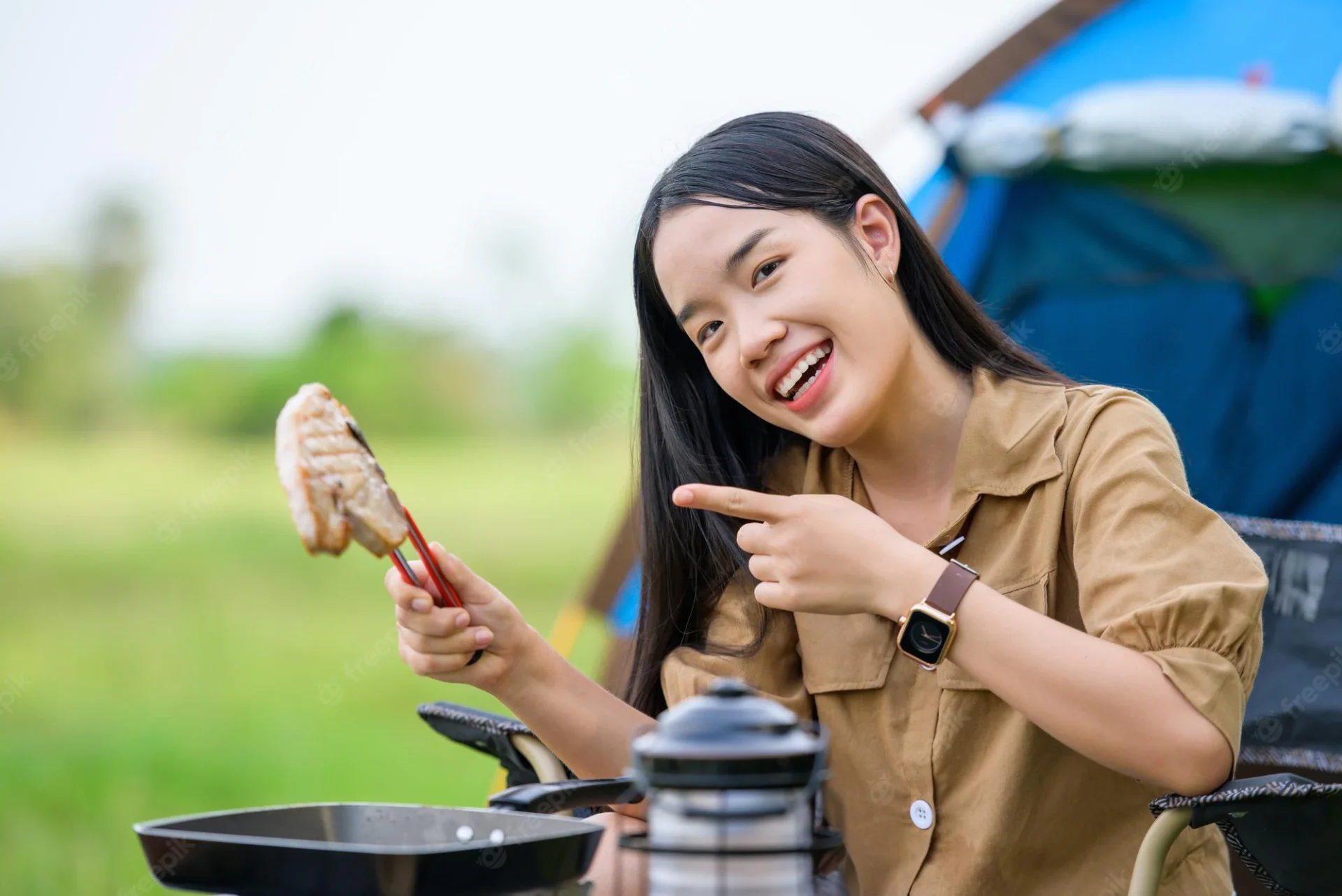 Chinese woman eating pork