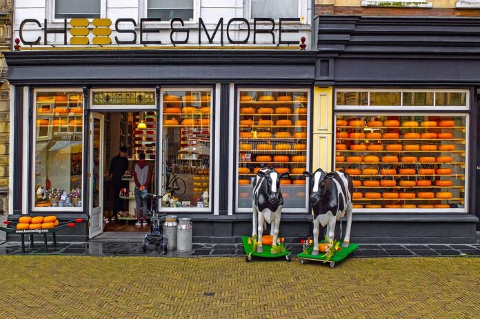 Global supply chain dynamics ensuring specialty cheese availability for cheese shops
