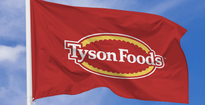 Red Tyson Foods Branded Flag in the wind with sky background