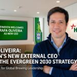 Rafael Oliveira, the newly appointed CEO of Heineken, stands in a professional setting, representing the company's shift toward external leadership and the implementation of the EverGreen 2030 strategy.